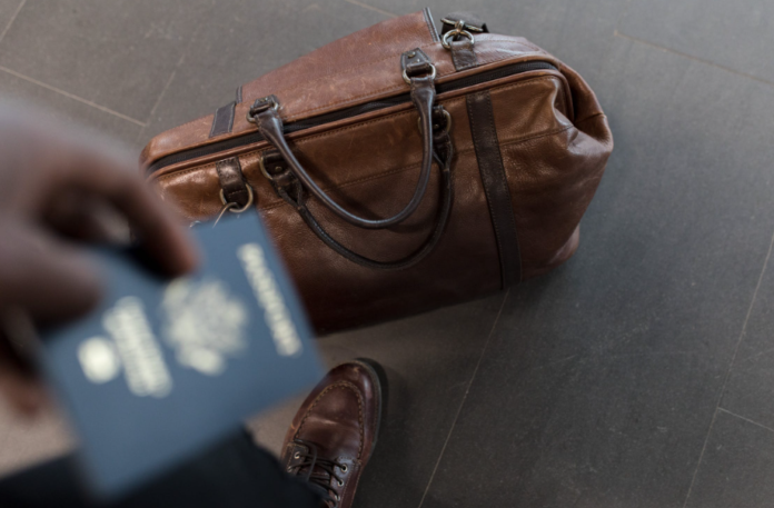 A person traveling after receiving emergency expedited passport in Delaware.